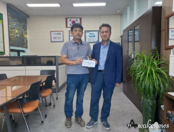 이기갑 농장주와 이윤행 일동면장